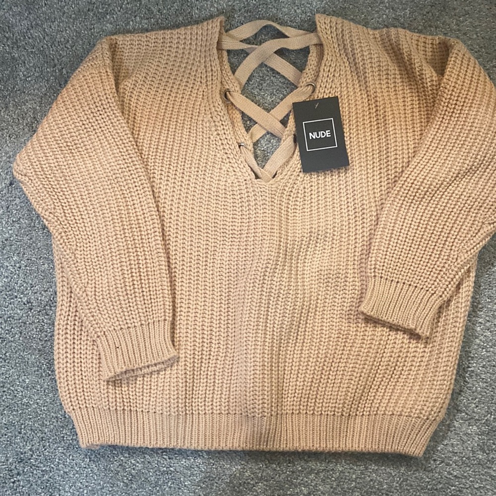New with Tags sweater with plunging neckline!
